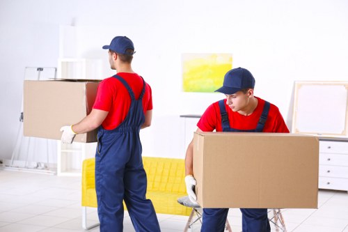 Man with van loading items in Hampstead for a small local move