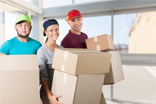 Shared student house move in Hampstead with organized boxes and household items