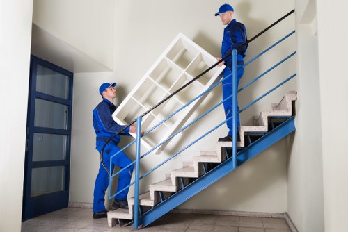 Professional removals team navigating a Hampstead street