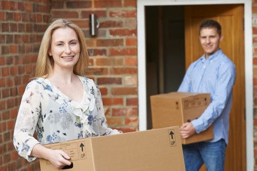 Local Hampstead removals team packing and loading furniture for a same day move