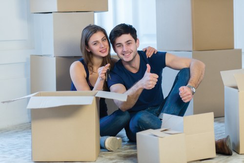 Professional movers handling a Hampstead office relocation in a busy London street