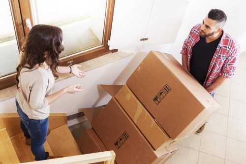 Mover handling packed items carefully during a house move