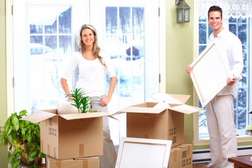 Removal team loading boxes and furniture for a Hampstead move